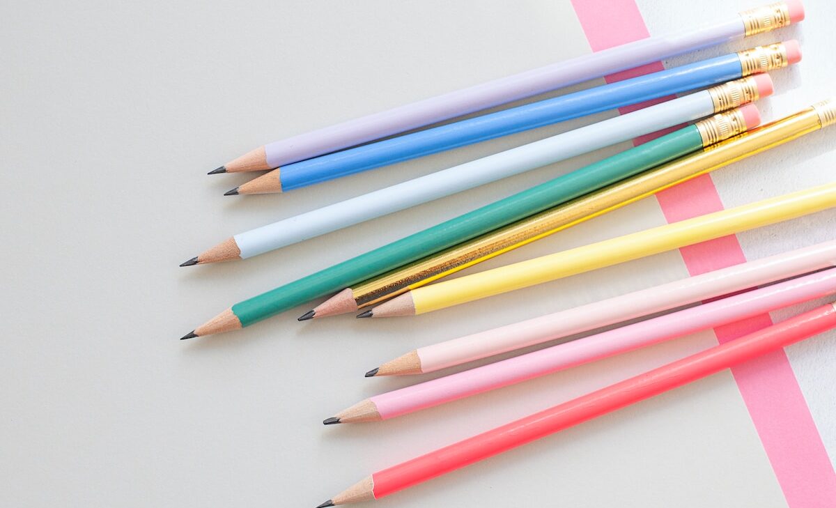 assorted-color pencil lot on white surface